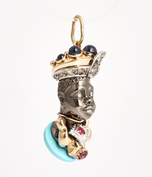 A gem set Blackamoor pendant.