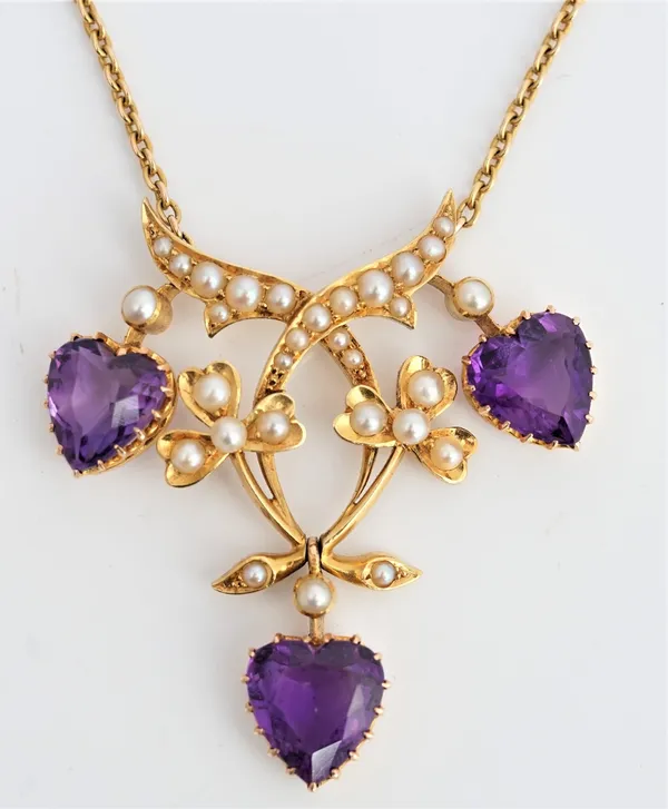 A gold, amethyst and seed pearl pendant necklace.