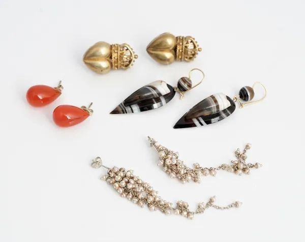 A pair of banded agate drop shaped pendant earrings, the tops with bead surmounts, a pair of cornelian drop shaped bead earrings and two further...