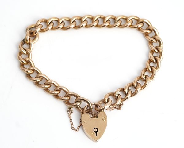 A gold curb link bracelet, detailed 9 C, on a gold heart shaped padlock clasp, detailed 9 C, circa 1910, weight 10.3 gms, with a case.