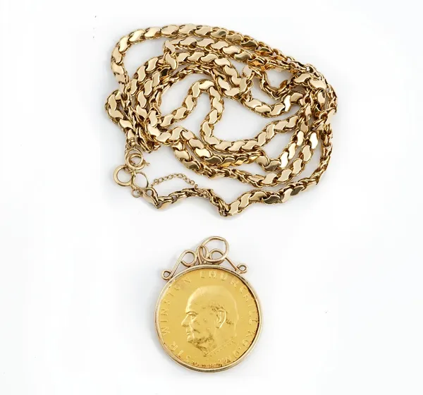 A gold medallion commemorating Sir Winston Churchill, in a gold pendant mount, gross weight 20 gms, with a 9ct gold  multiple link neck chain on a...