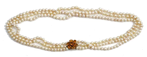 A three row necklace of cultured pearls
