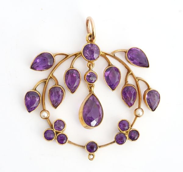 A gold, amethyst and seed pearl set pendant, in an openwork design, mounted with pear shaped and cushion shaped amethysts and with two seed pearls,...