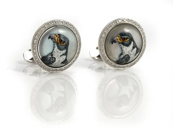 A pair of white gold, diamond and reverse painted intaglio crystal dress cufflinks, each circular front with a reverse painted intaglio crystal...