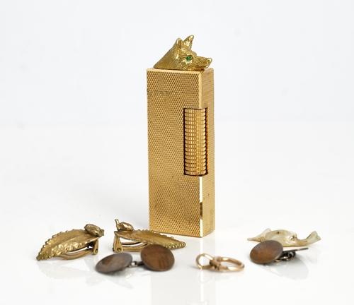 A gold bolting clasp (un-marked), gross weight 1.6 gms, a section of pearl modelled as a bird, having a red gem set eye, a pair of gilt metal...