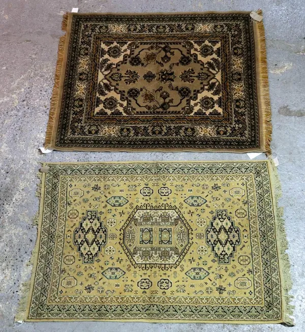 Two machine made rugs, brown fields, 174cm x 117cm and 166cm x 137cm (2)