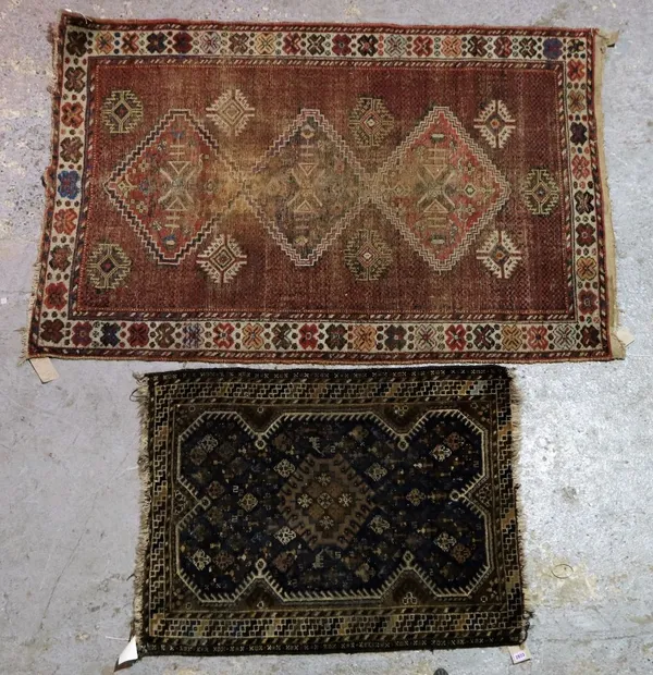 A Shiraz rug, indigo field with one medallion, 112cm x 86cm.