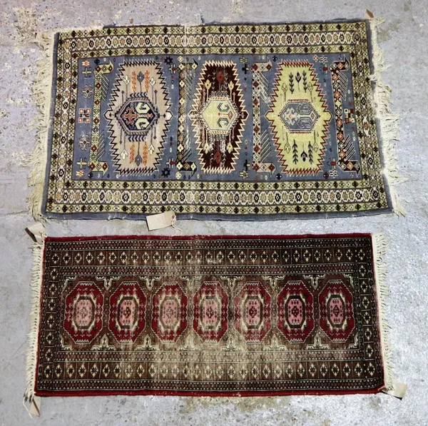 Two Pakistan rugs, one with three medallions, 144cm x 93cm,