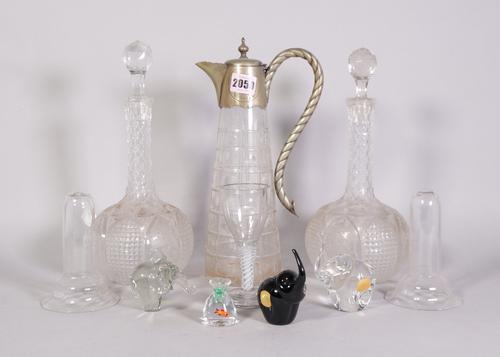 A group of silver plate and glass including; a pair of early 20th century cut glass decanters, 30cm high (qty)