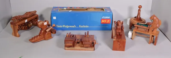 A large quantity of modern hardwood automaton toy figures