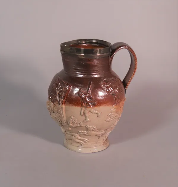 A silver mounted salt glazed jug, 19cm high