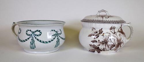 A black and ivory silk shawl, early 20th century, embroidered all-over with insects amongst flowering scrolling branches, deep fringed,