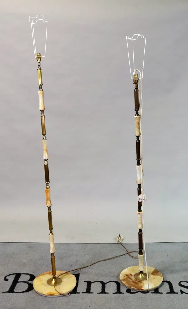 A pair of modern onyx and brass standard lamps and another white painted hardwood standard lamp, 134cm high (3).