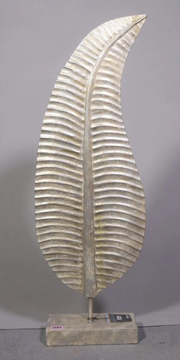 A modern silver painted hardwood sculpture of a leaf
