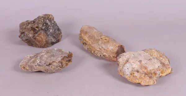 Four pieces of rough amber (4)