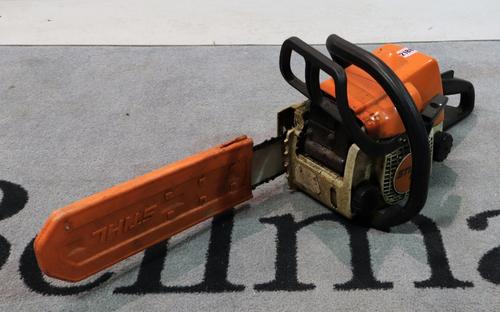 A Stihl 017 Chainsaw.
