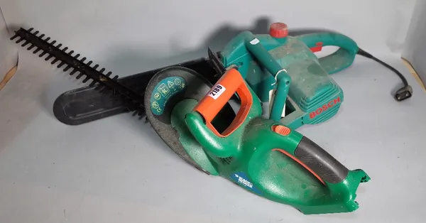 A Bosch electric chainsaw and a Black and Decker Hedgecutter