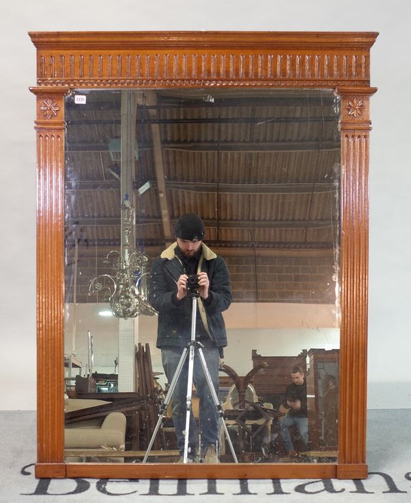 A late 19th century French walnut framed mirror, with reeded frame