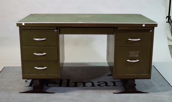 A mid-20th century green painted metal kneehole desk with six short drawers