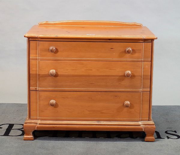 A modern pine chest of three long graduated drawers, 85cm wide; 75cm high