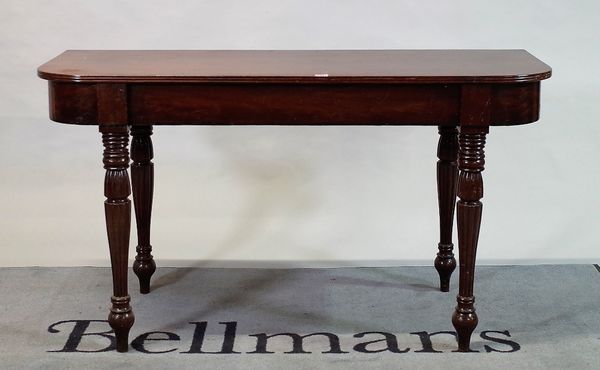 A Regency mahogany 'D' shape console, on reeded baluster supports