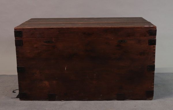 An early 20th century pine and iron-bound trunk