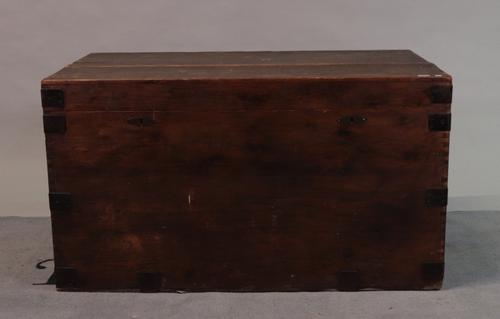 An early 20th century pine and iron-bound trunk
