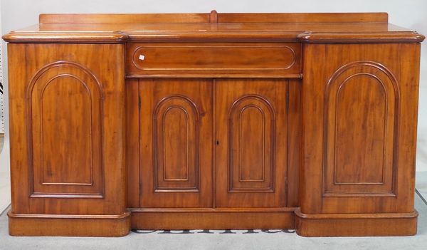 A 19th century mahogany mirrored breakfront sideboard with single drawer flanked by arched panelled doors on a plinth base