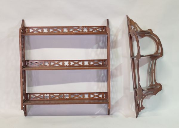 A modern mahogany three-tier hanging wall shelf, 72cm wide; 82cm high