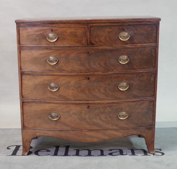 A late George III mahogany bowfront chest of two short and three long drawers