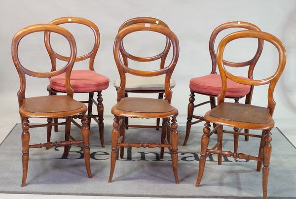 A set of six Victorian mahogany balloon-back dining chairs