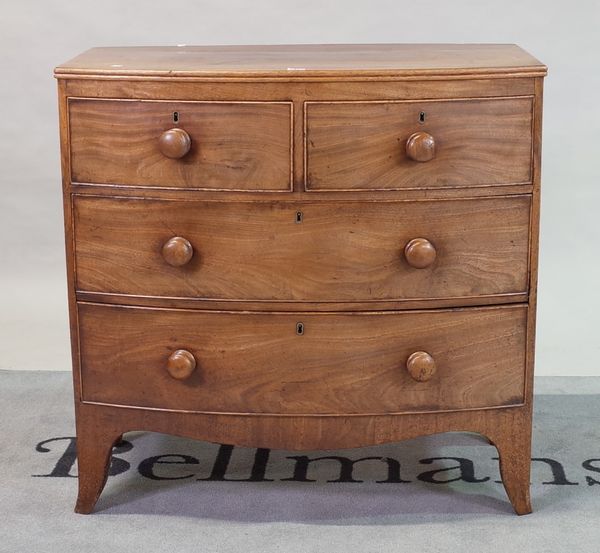 A 19th century mahogany bowfront chest of two short and two long drawers