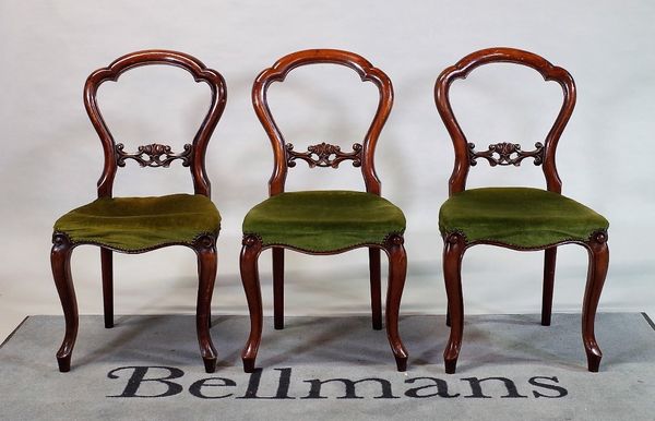 A set of seven Victorian mahogany dining chairs