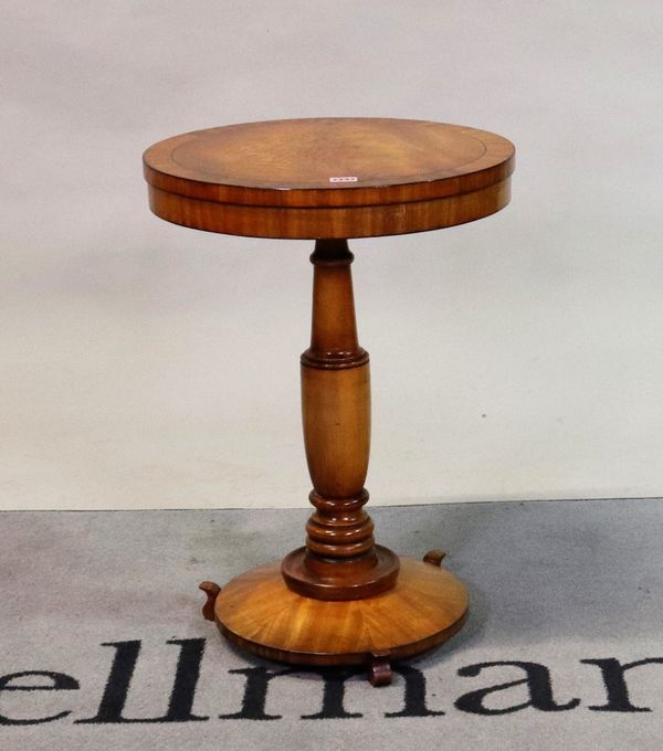 A William IV style mahogany and ebony banded circular occasional table on a turned column