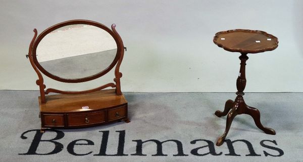 A Victorian mahogany dressing table mirror with an oval plate over three frieze drawers, 45cm wide; 50cm high