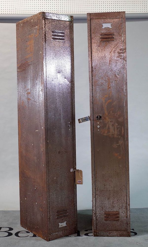 A modern steel floor standing locker and another painted grey locker