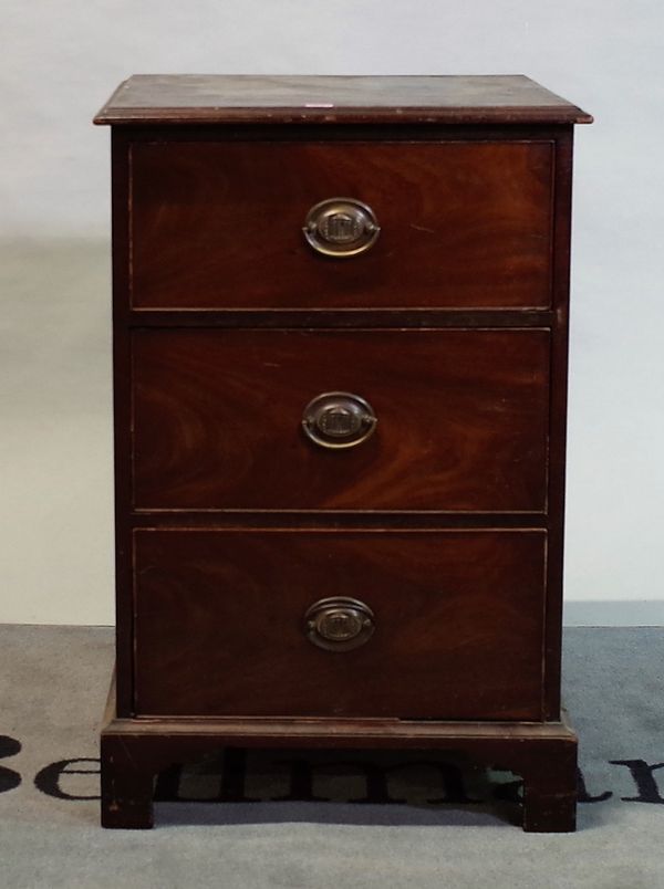 A 19th century mahogany side chest of three short drawers on bracket feet