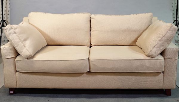 A modern hardwood framed two seater sofa