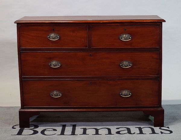 A 19th century mahogany chest of two short and two long drawers on bracket feet