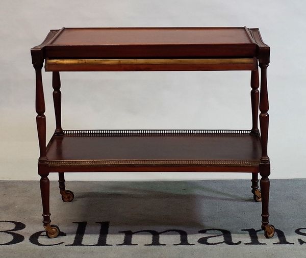 A late 19th century French mahogany and brass bound folding two tier trolley