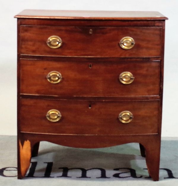 A 19th century bowfront chest of three long graduated drawers