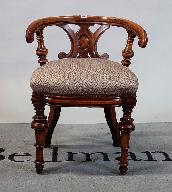 A Victorian mahogany tub back office chair