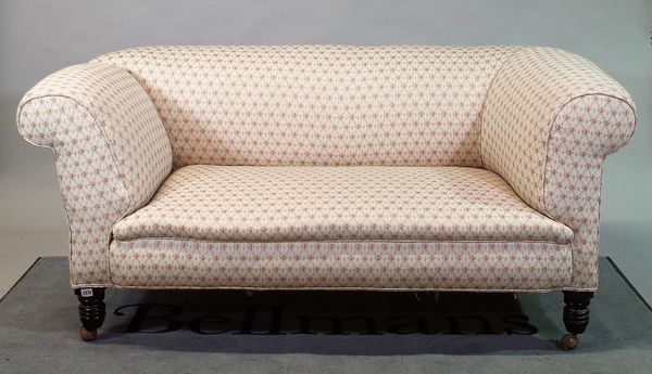 A 19th century upholstered Chesterfield type drop end sofa