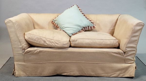 A pair of modern cream upholstered sofas