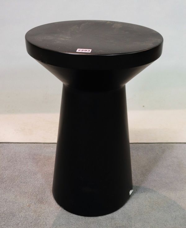 A modern black painted metal circular occasional table