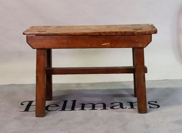 A 19th century elm and pine rustic low side table on block supports