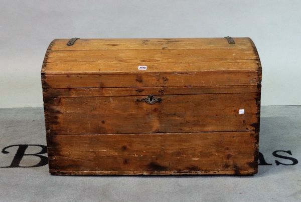 An early 20th century pine strapped iron bound trunk