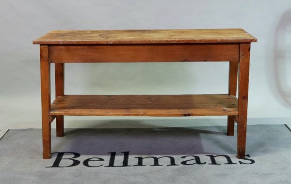 An early 20th century two-tier pine side table