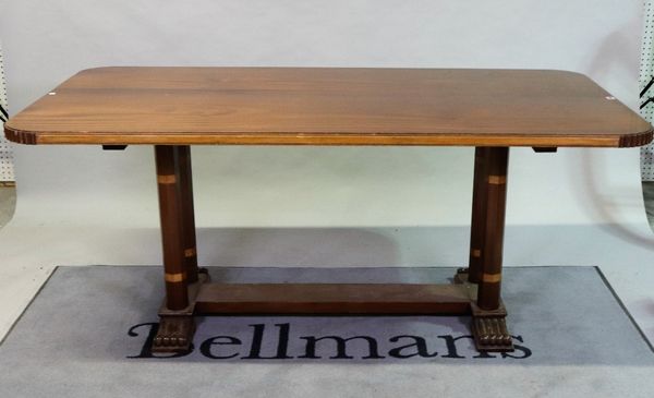 An Art Deco style rectangular walnut dining table