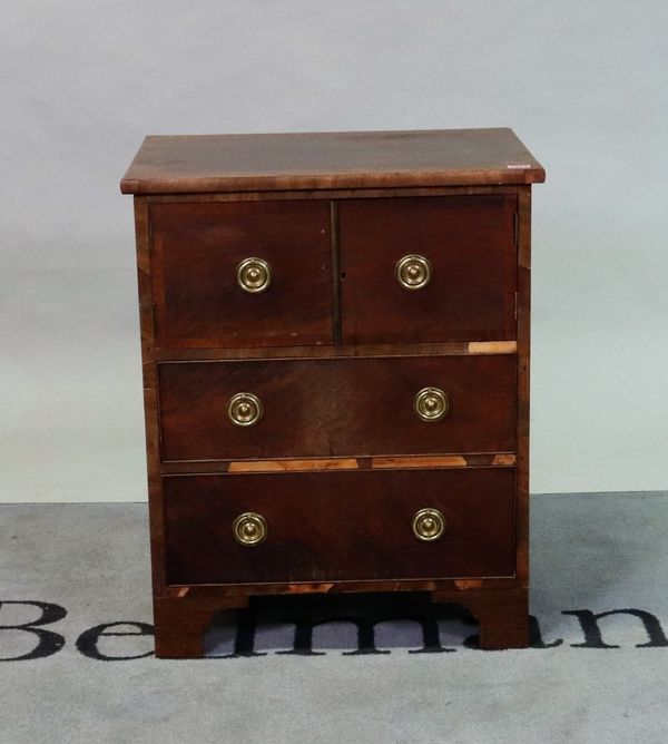 A 19th century mahogany commode converted to a side cabinet with pair of drawers